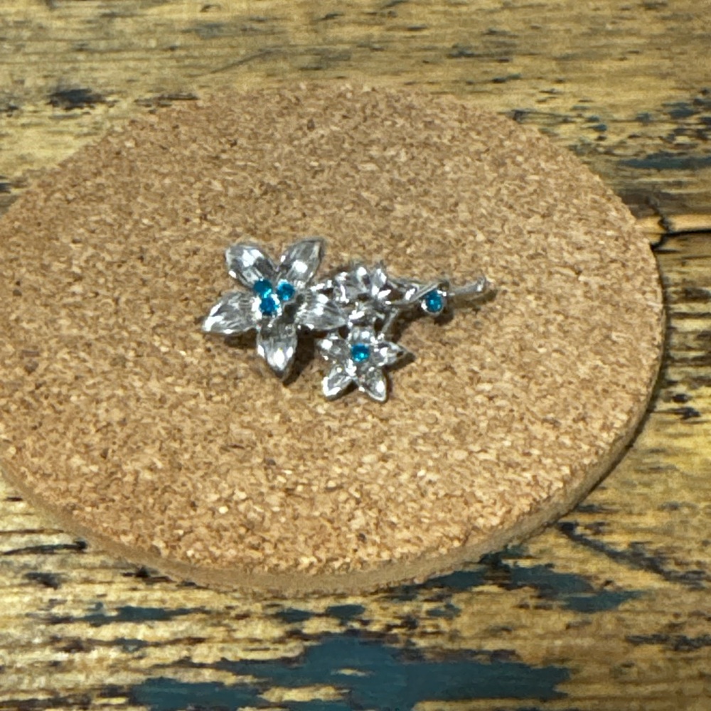Elegant Silver and Blue Floral Brooch